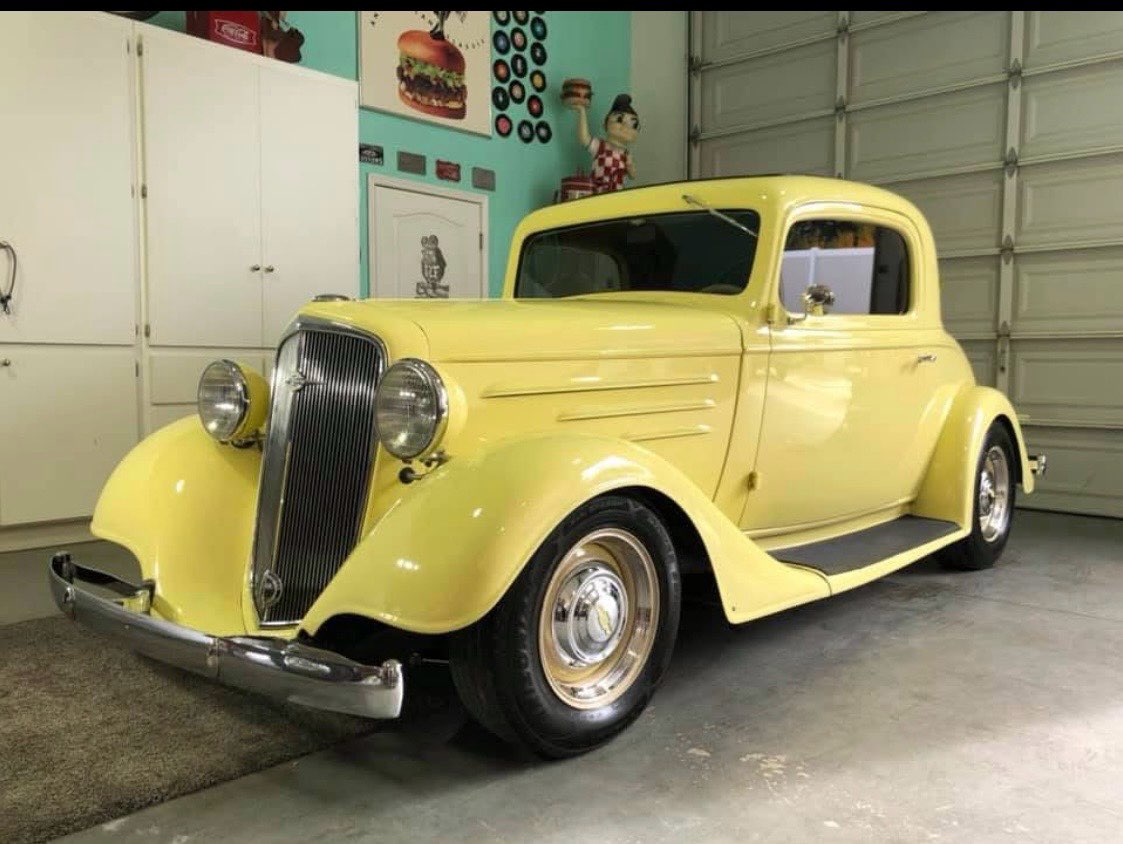 Yellow classic coupe with a flawless gloss finish