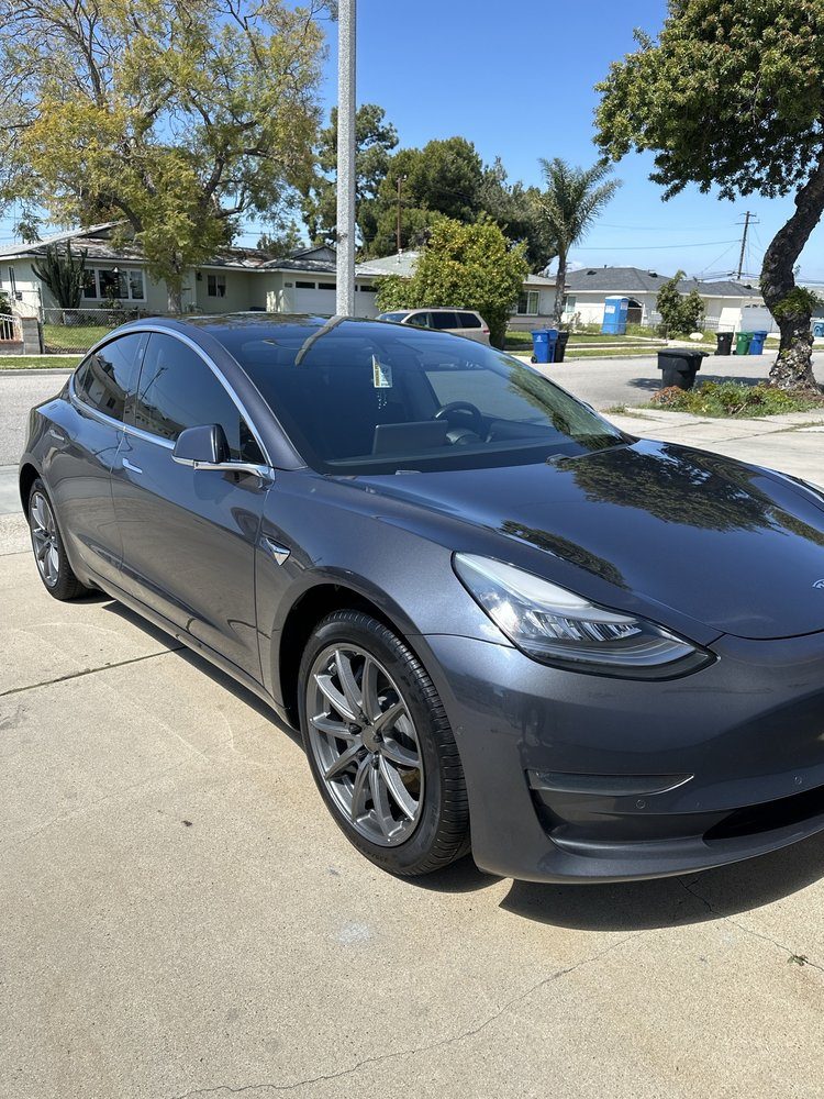 Tesla detailed on location in the driveway