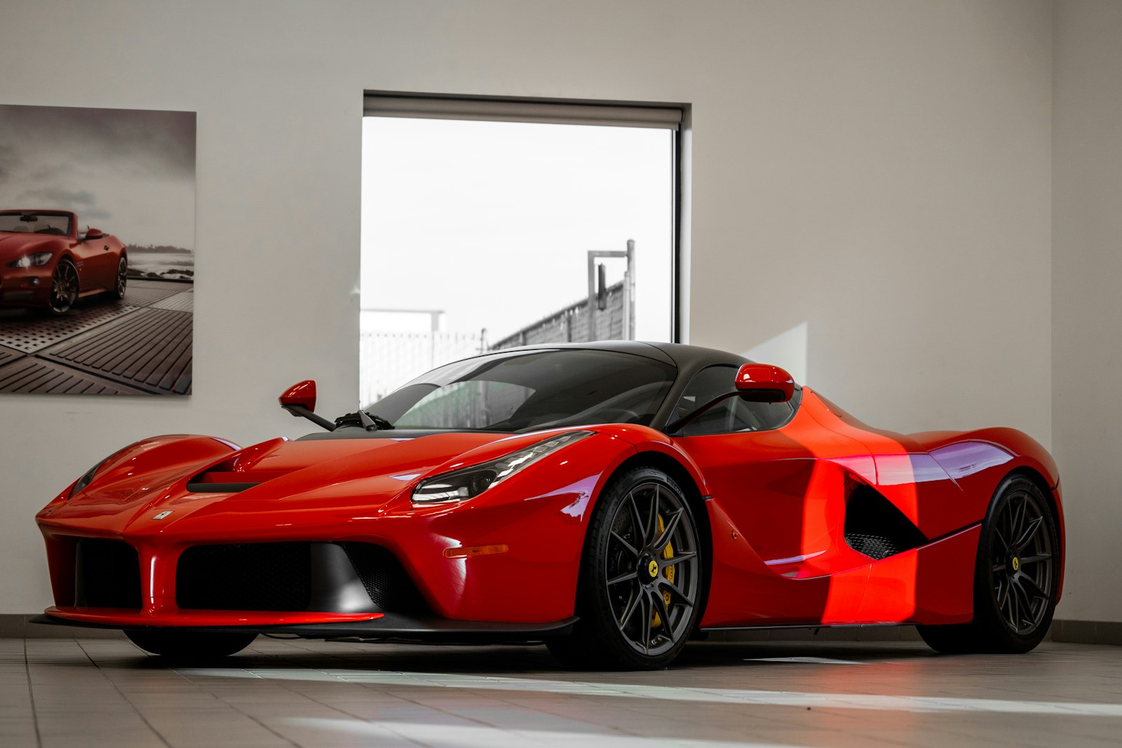 Glossy red supercar with a flawless corrected finish